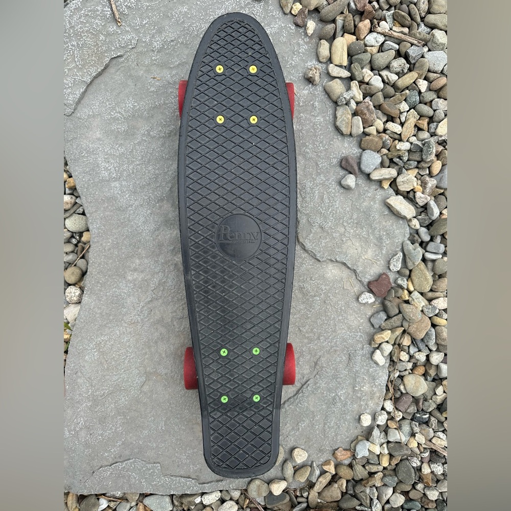 Black Skateboard with Red Wheels